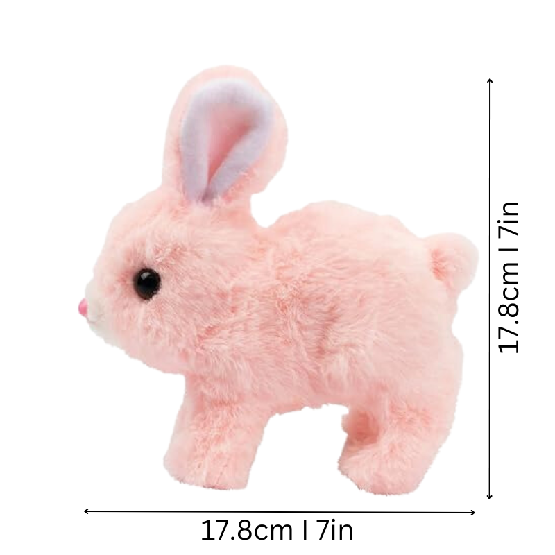 Toddler playing with HoppyPal plush walking bunny toy on a wooden floor