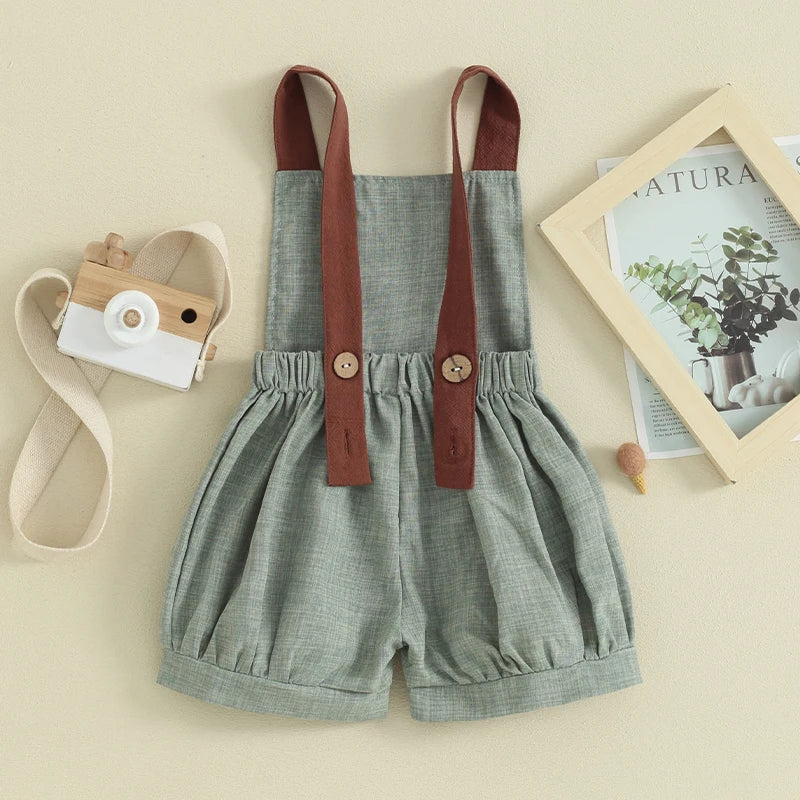 Sleeveless denim romper for infant boys, featuring stylish patchwork and comfort blend