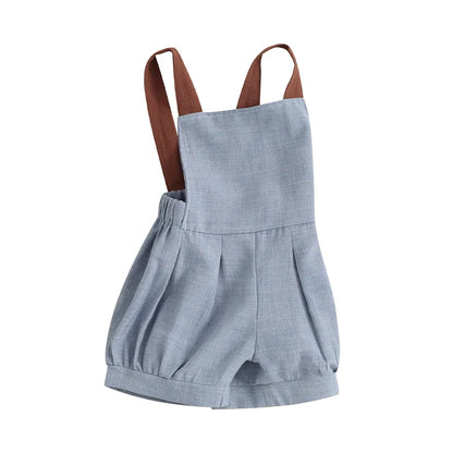 Sleeveless cotton blend denim romper for baby boys, featuring cool patchwork design