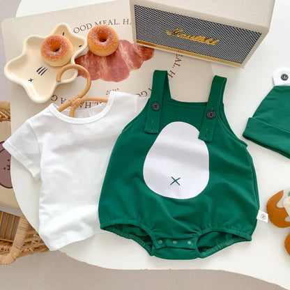 Close-up of soft green frog design on infant cotton romper, featuring snap closures for easy changes.