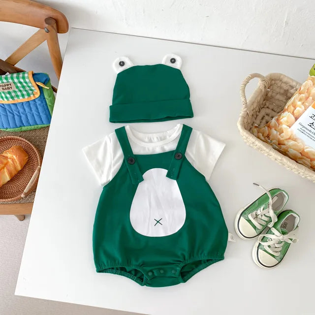 Flat lay of infant frog design cotton romper and cap set, a charming and practical baby shower gift.