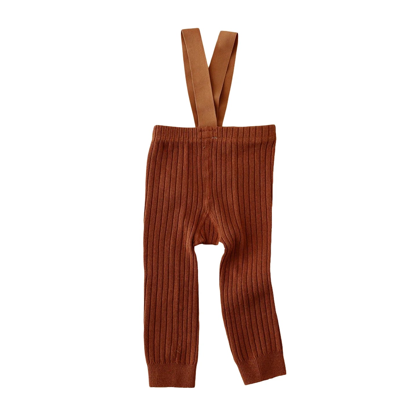Infant girl modeling ribbed knit overalls, comfortably seated, highlighting the flexibility of the baby clothing.