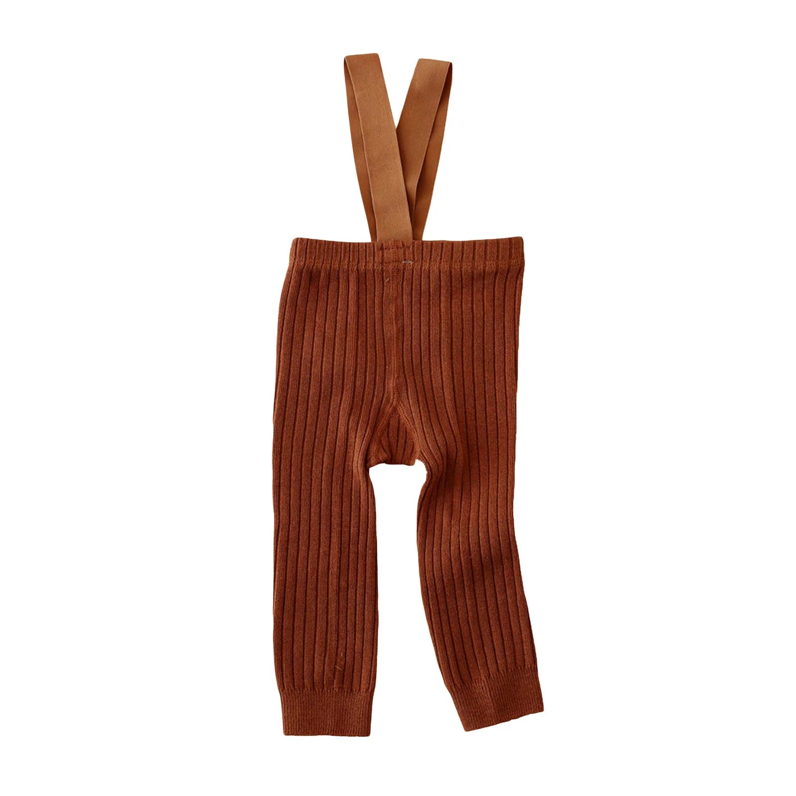 Infant girl modeling ribbed knit overalls, comfortably seated, highlighting the flexibility of the baby clothing.