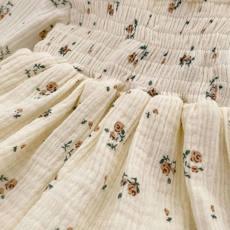 White infant cotton romper with vibrant floral accents, O-neck for easy dressing, baby girl clothing