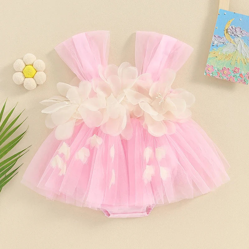 Closeup of a baby floral romper with delicate tulle detail, perfect for newborn girls.