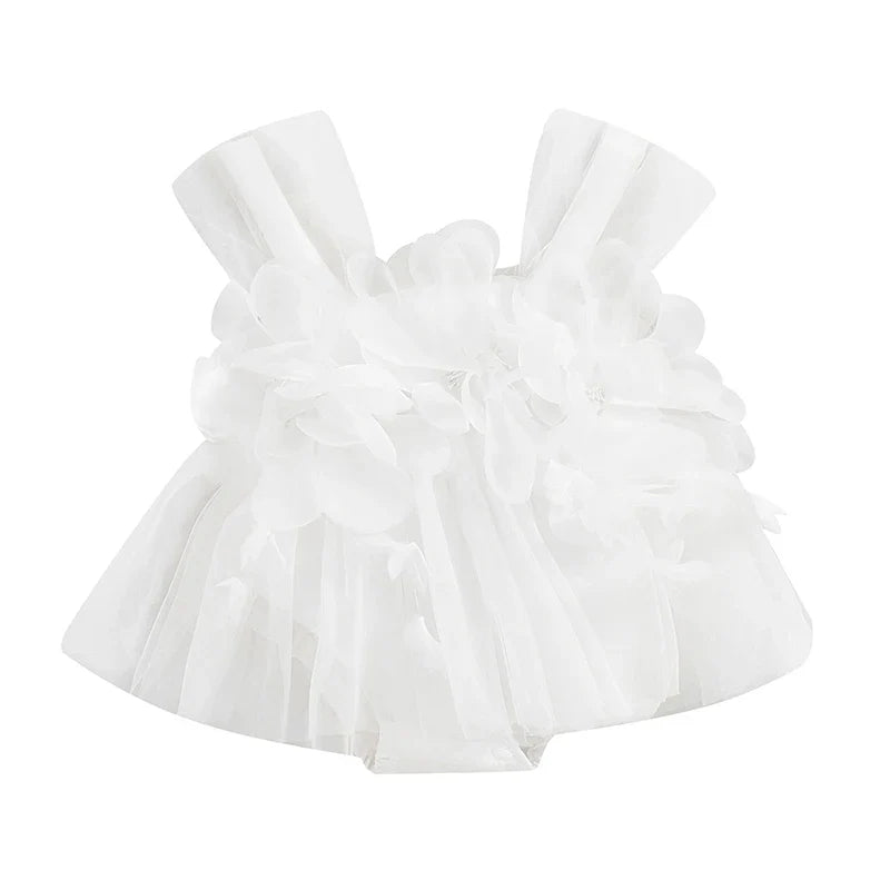 Full shot of a newborn girl's floral tulle romper, a charming and stylish baby outfit.