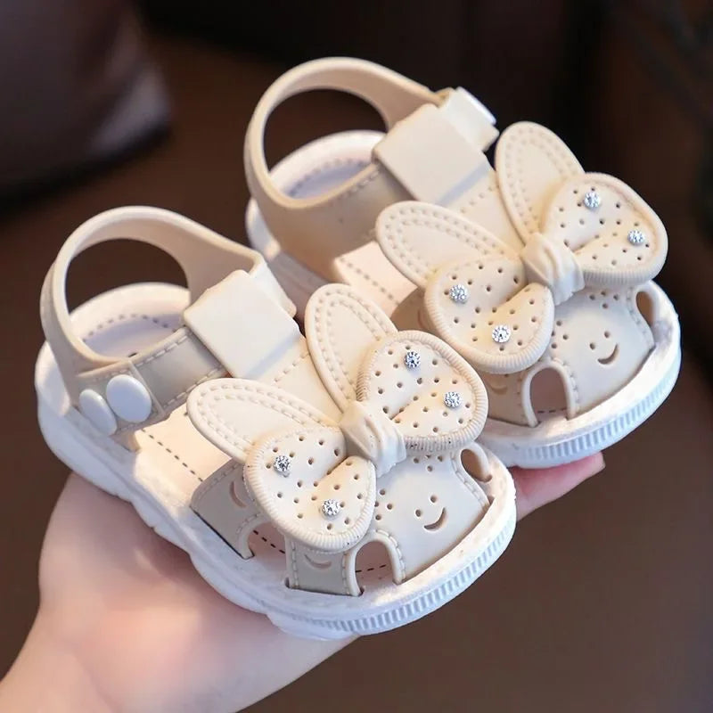 PVC infant girl sandals with charming bow detail, ideal toddler summer wear