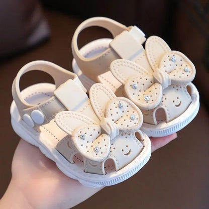 PVC infant girl sandals with charming bow detail, ideal toddler summer wear