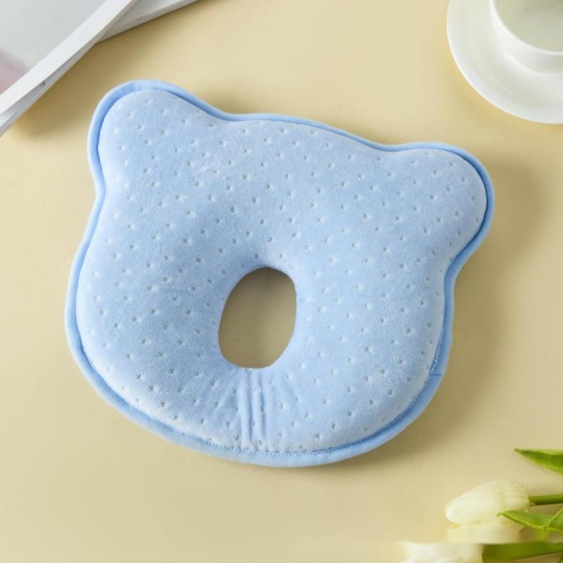 Infant memory foam head shaping pillow in white, soft for flat head prevention and newborn support.