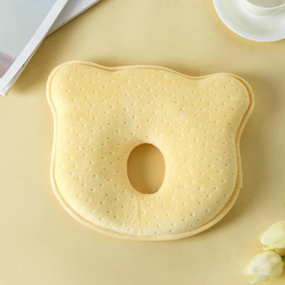 Baby sleep support: White memory foam head shaping pillow for babies, prevents flat head.