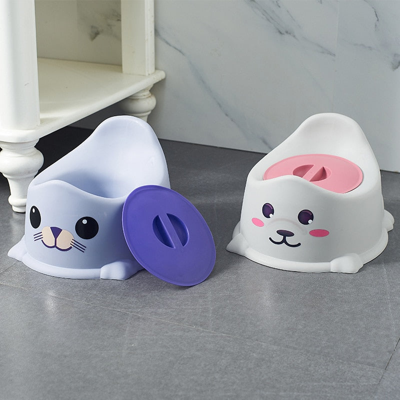 Infant potty training seat with an odor-lock lid for hygienic toddler toilet training.
