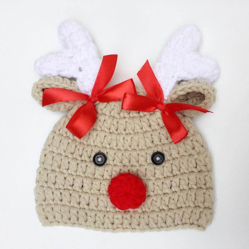 Unisex baby reindeer Christmas beanie, perfect for infants. Warm gray & red holiday cap for kids.