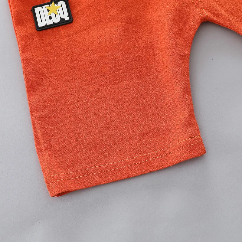 Dinosaur print short sleeve outfit set for infants and toddlers. Ideal baby clothes for everyday wear.