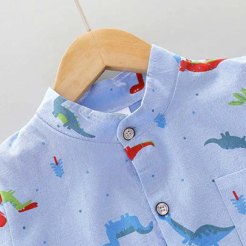 Toddler in dinosaur print short sleeve set. Stand-up collar top, breathable cotton for infant clothing.