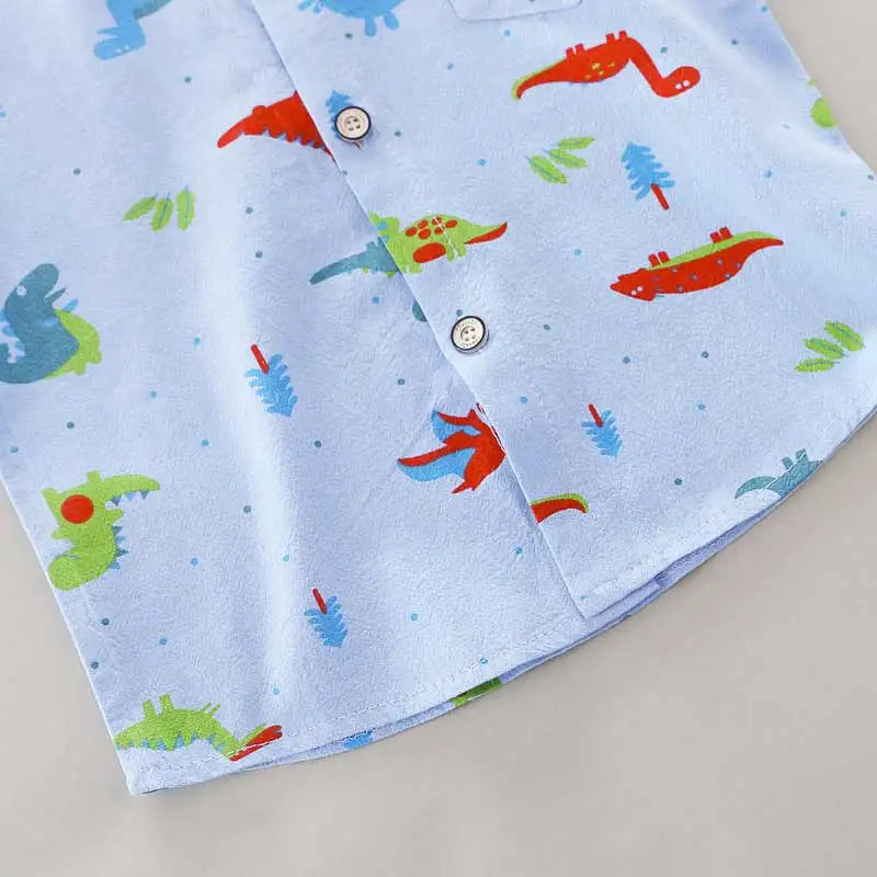 Dinosaur print short sleeve toddler outfit set. Features a stand-up collar and elastic waist shorts.