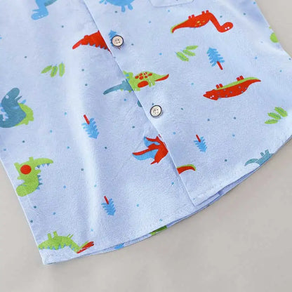 Dinosaur print short sleeve toddler outfit set. Features a stand-up collar and elastic waist shorts.