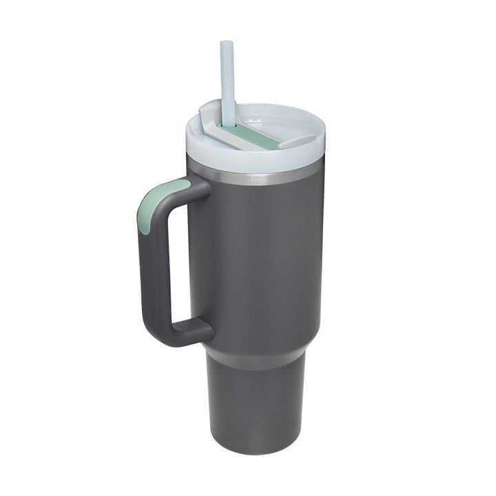 Versatile 40 oz insulated coffee cup for hot or cold drinks. Features a handle and sip straw.