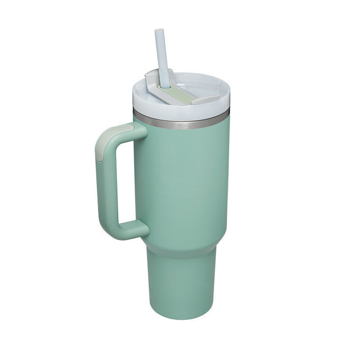 Insulated 40 oz straw mug with comfortable handle for hot coffee or cold water.