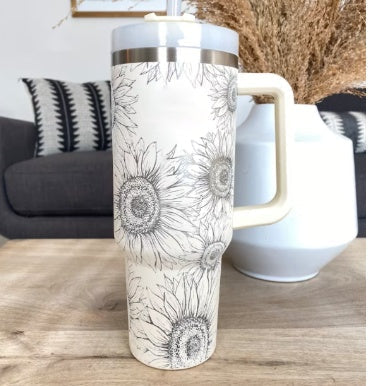 Versatile 40 oz insulated straw mug with handle, ideal for hot tea or cold water.