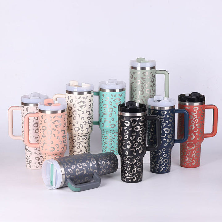 Stay hydrated with this 40 oz insulated water bottle, complete with handle & straw for easy sipping.