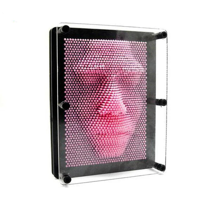 Adult novelty pin art board on a desk, a fun interactive toy and modern home decor accent.