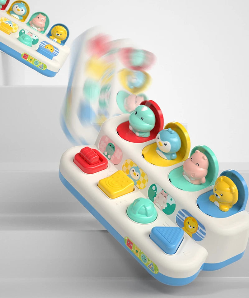 Adorable baby playing with an interactive button toy, fostering skill development