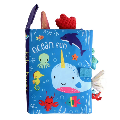 Assorted interactive baby cloth books; jungle, dinosaurs, farm, unicorn, ocean sensory toys.