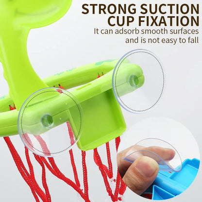 Toddler playing with bath basketball hoop and floating balls, safe water toy
