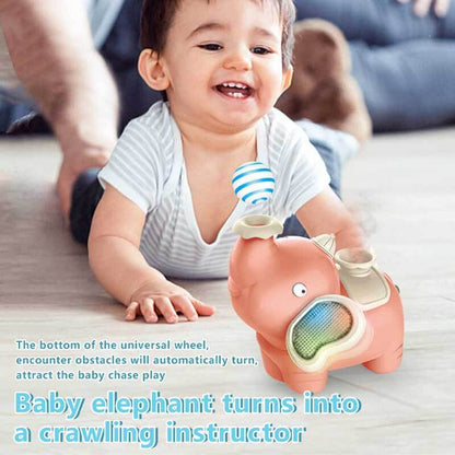 Toddler playing with an interactive elephant activity toy designed for crawling and learning