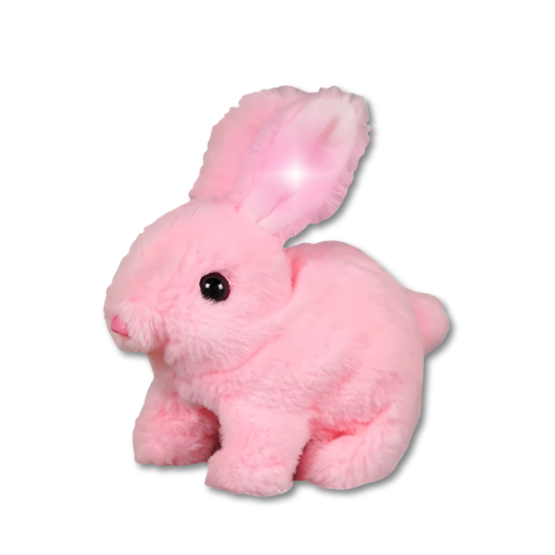 Toddler playing with an interactive hopping bunny plush toy, soft and engaging with glowing ear features.
