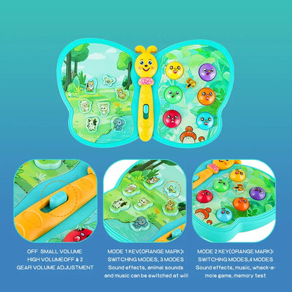 Close-up of a smiling infant playing with an educational light-up butterfly musical toy on a playmat