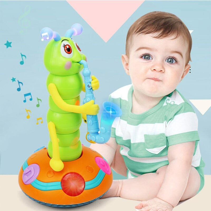 Preschooler engaging with an interactive musical caterpillar toy, developing fine motor skills and coordination.