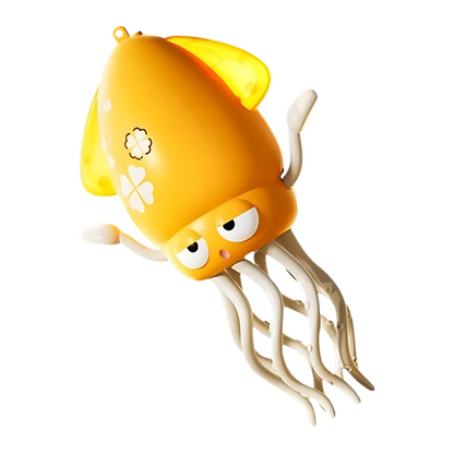Toddler playing with a luminous and dancing octopus toy, USB rechargeable fun