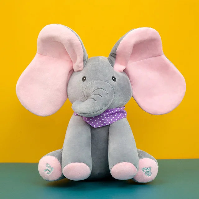Child hugging a cuddly interactive musical elephant, ideal comfort toy for young kids.