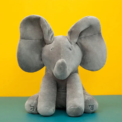 Interactive elephant plush toy with embroidered details, a perfect musical baby gift.