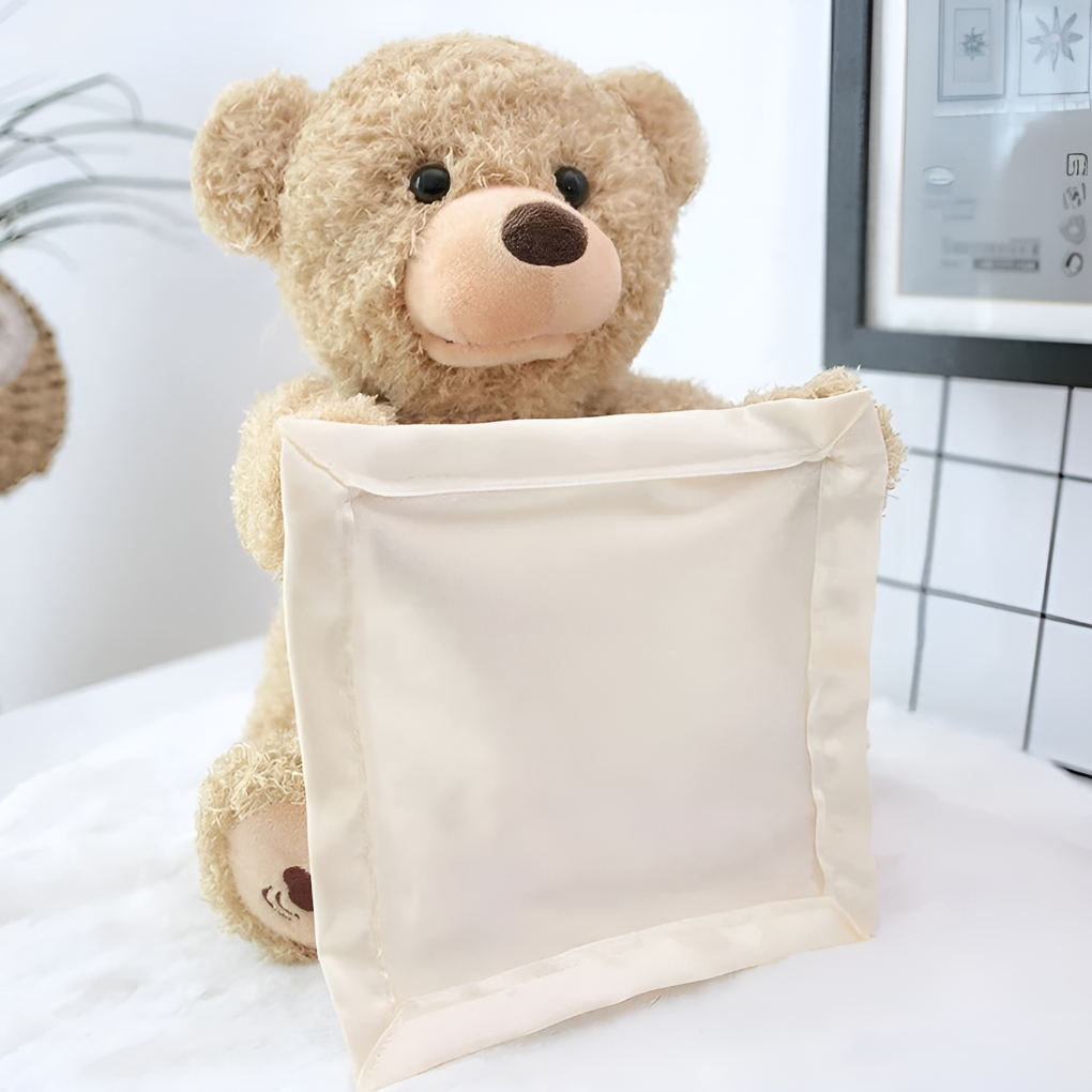 Cuddly interactive peek-a-boo bear, a perfect baby shower or toddler gift. Engaging plush animal.