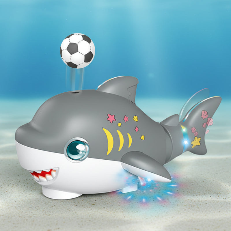 Musical activity toy: an interactive shark that moves, lights up, and plays sounds for children.