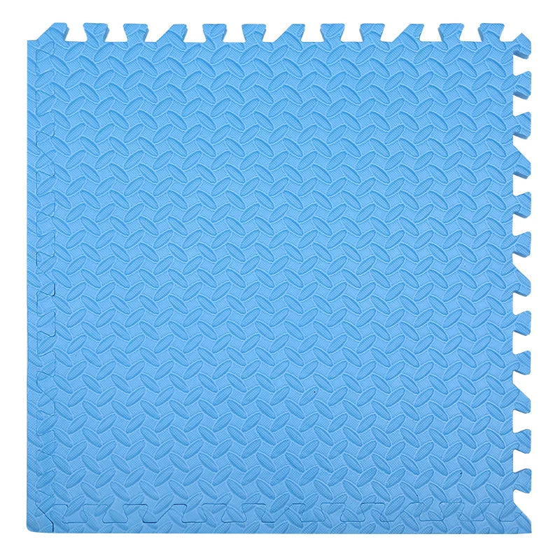 Close-up of interlocking foam puzzle mat showing smooth, easy-to-clean surface for baby