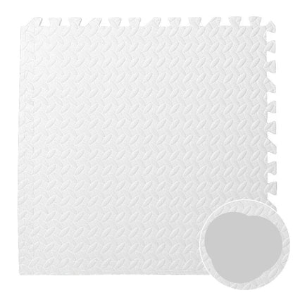 High-angle view of an interlocking foam puzzle play mat in a modern nursery setting