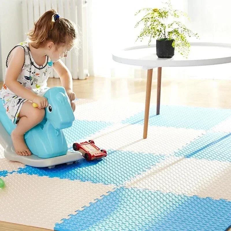 Baby girl crawling and playing on a colorful interlocking foam puzzle play mat, safe for toddlers