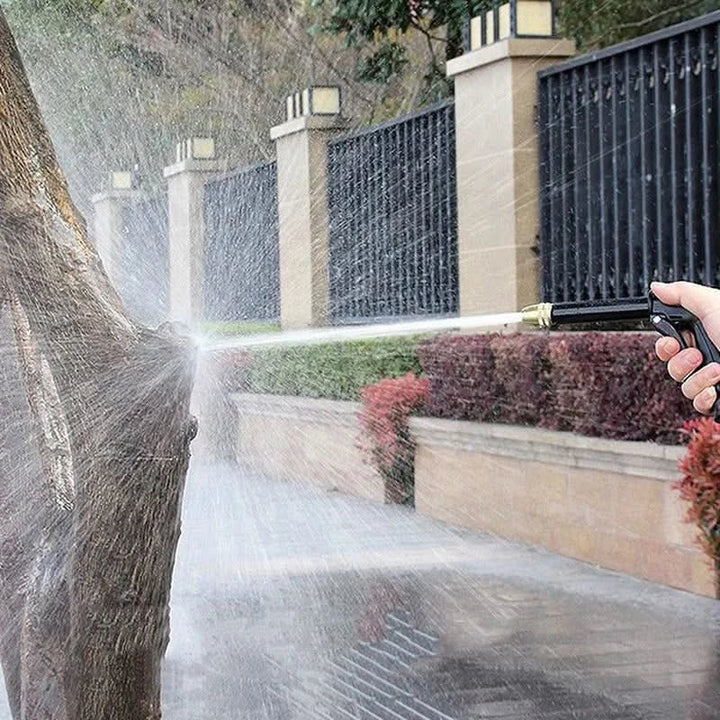 JetSpray High-Pressure Water Gun effectively cleaning a car, removing dirt & grime with a powerful stream.