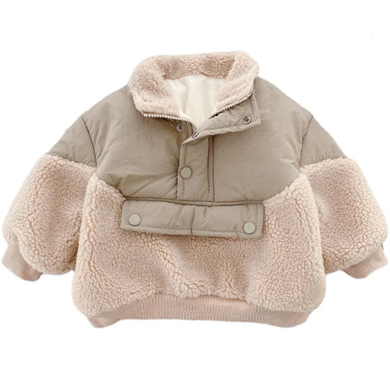 Detail of the fleece texture and lambswool collar on a girls' winter jacket