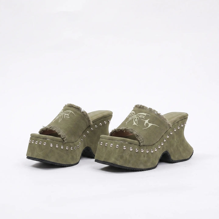 Bold women's chunky platform sandals, retro mule with studded details & high block heel. Statement summer footwear.