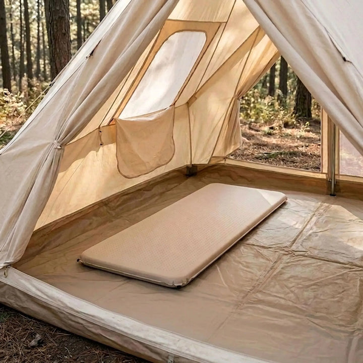Khaki self-inflating camping sleeping pad, comfortable and portable outdoor gear for adventure nights.