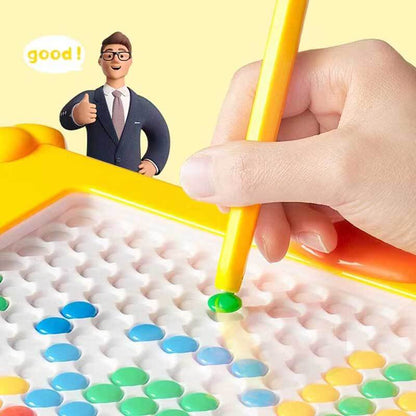 Overhead view of a magnetic drawing board showing a child's doodle, educational and engaging toy.