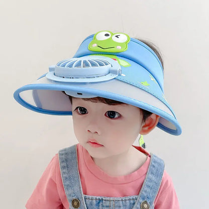 Kid wearing blue cooling fan hat with UV protection, playing outdoors in summer sun