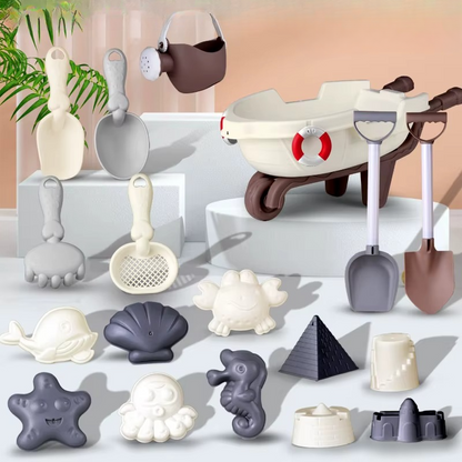 A variety of colorful sand molds from a kids' outdoor beach toy set, featuring sea creatures.