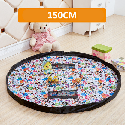Portable toy storage bag unfurled as a play mat with scattered children's toys on its surface