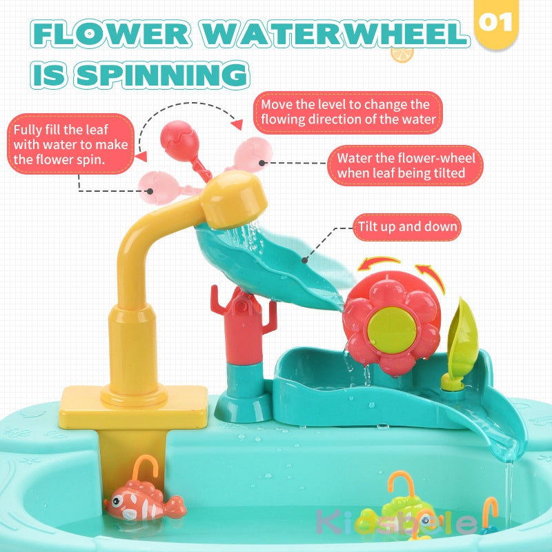 Little boy happily fishing in the kids' 2-in-1 water play sink, educational pretend toy