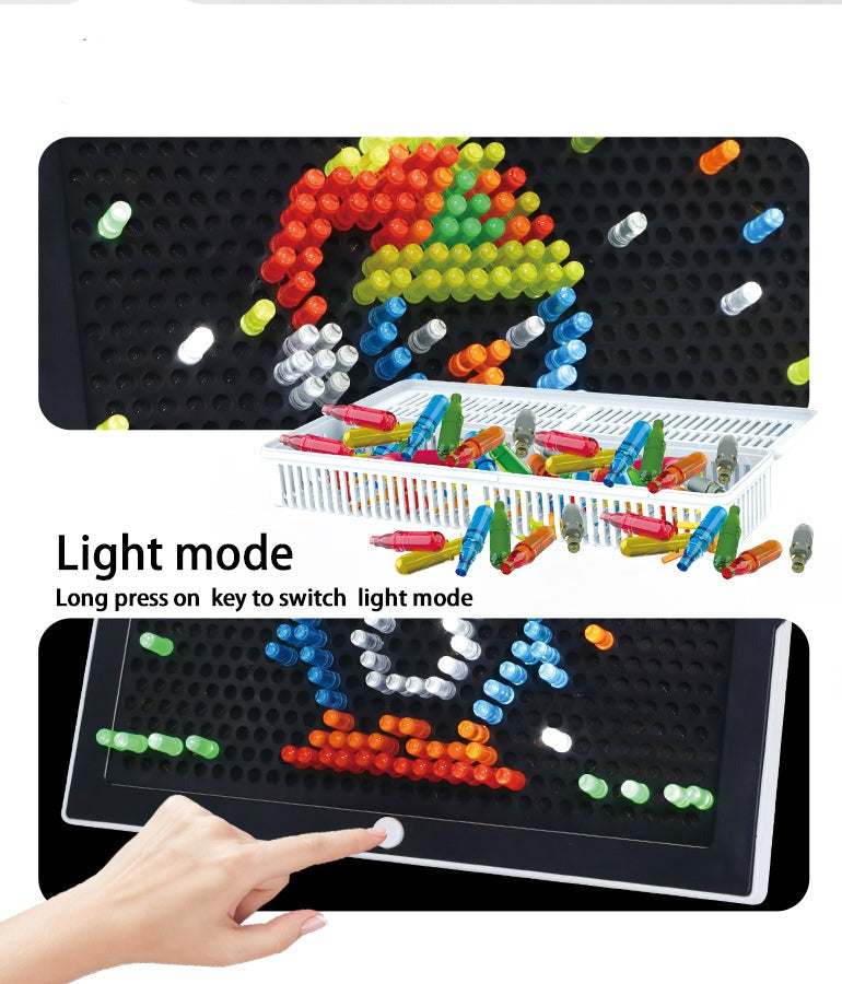 Toddler hands arranging vibrant building blocks on a light-up panel, enhancing motor skills and creativity